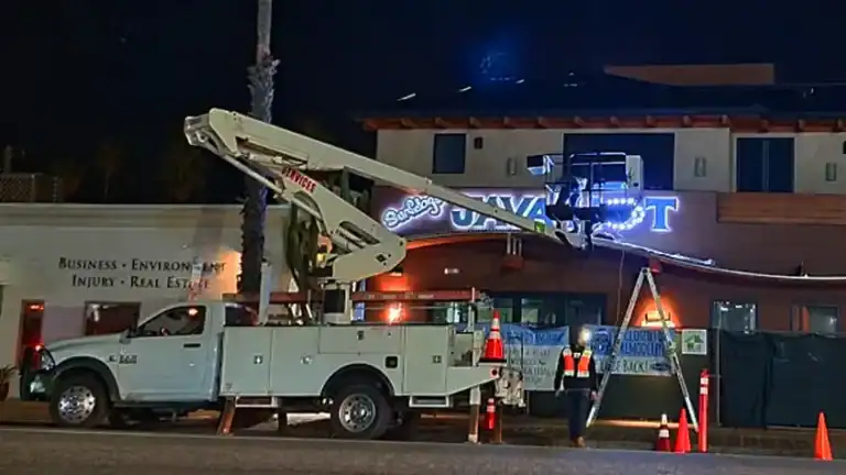 "Surfdog's Java Hut" nighttime install of channel letter signs in Encinitas, CA.