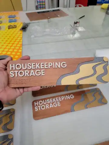 Sophisticated four-finish ADA signage tailored for upscale hospitality Polished four-finish ADA sign — luxury-grade accessibility for hotels