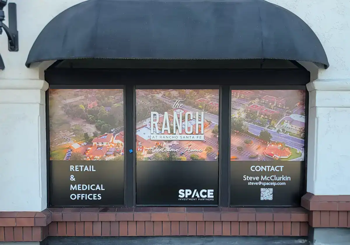 For the featured image: Large format window graphic signage installed at The Ranch at Rancho Santa Fe advertising retail and medical office leasing.
